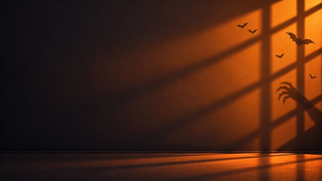 A spooky halloween background featuring a dark room with orange window light shadows and silhouettes of flying bats and a reaching hand