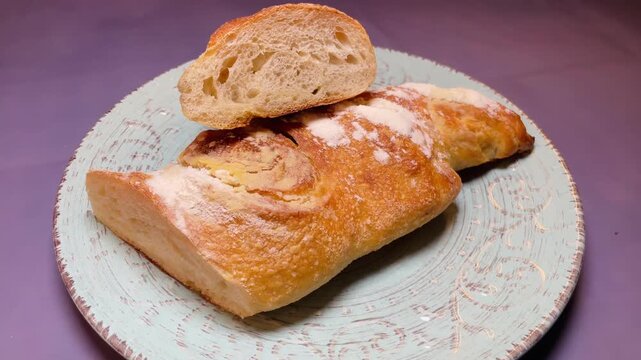 Food and everyday nutrition or culinary tradition. Fresh bread as a bakery product. Pastry and dough-based bakery products close-up. 
