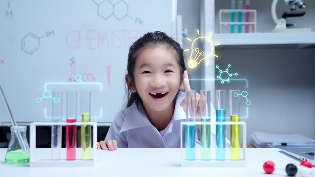 Asian student girl learning science in laboratory pointing at glowing holographic lightbulb icon representing creative innovation and discovery for stem education and digital e-learning concepts