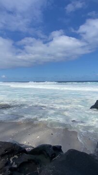 Untamed waves at Le Baracholes beach, Reunion