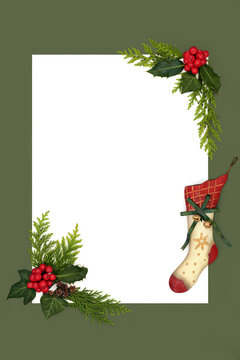 Christmas stocking vintage decoration, holly berry, ivy, fir leaves background on green, white blank letter for message. Design for invitation, card or letter to santa.