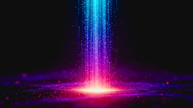 A vibrant glowing light beam with colorful particles streams down to a dark, particulate surface, creating a futuristic digital visual effect.