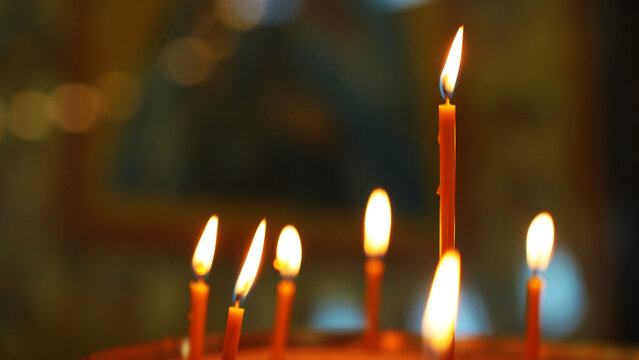 Orthodox church candles closeup with blurred background