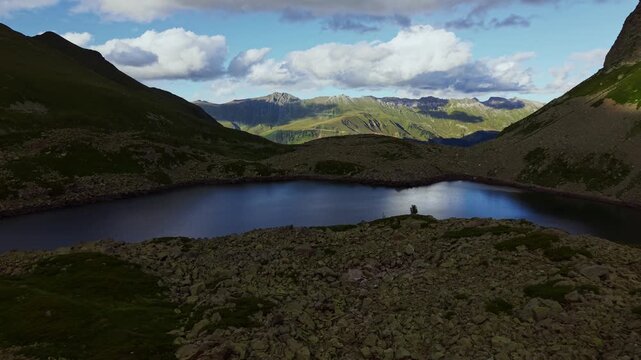Aerial View of Mountain Lake and Rocky Valley