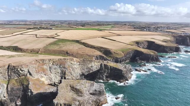 View of cliffs over Gunver Head and Trevone Bay from a drone, Trevone, Padstow, Cornwall, England, United Kingdom, Summer 2026