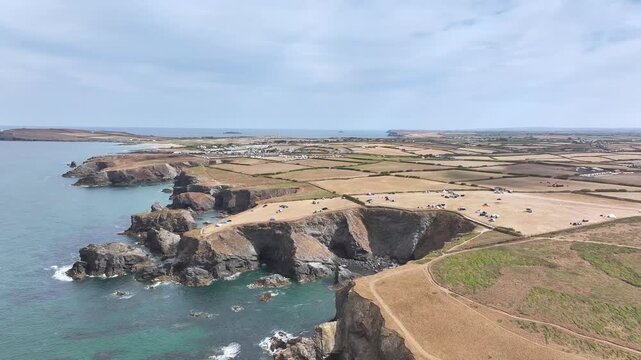 Farms and Fields over Cliffs and Porthcothan Bay from a drone, Porthcothan, Padstow, Cornwall, England, United Kingdom, Summer 2026
