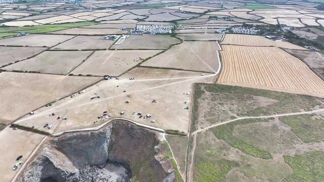 Farms and Fields over Cliffs and Porthcothan Bay from a drone, Porthcothan, Padstow, Cornwall, England, United Kingdom, Summer 2026