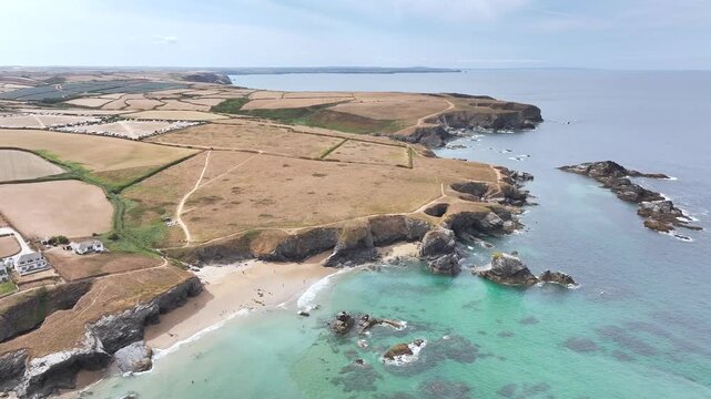 Farms and Fields over Cliffs and Porthcothan Bay from a drone, Porthcothan, Padstow, Cornwall, England, United Kingdom, Summer 2026