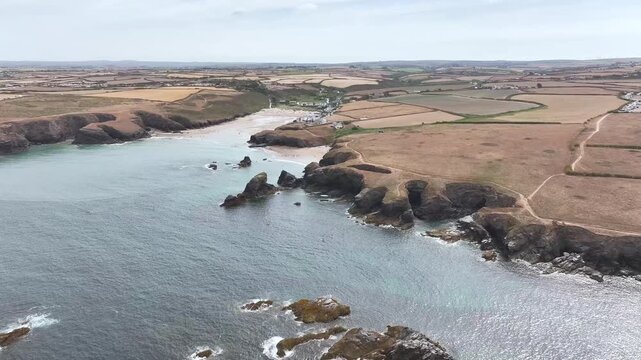 Farms and Fields over Cliffs and Porthcothan Bay from a drone, Porthcothan, Padstow, Cornwall, England, United Kingdom, Summer 2026