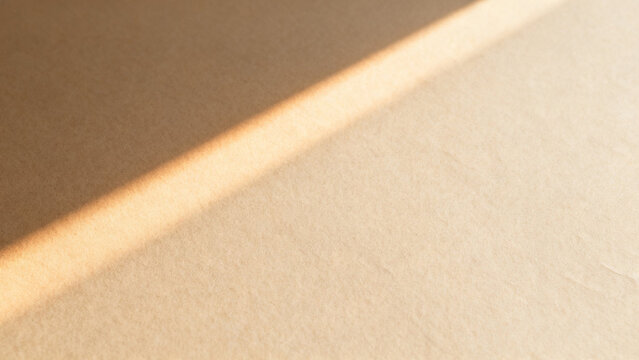 Sand Beige Paper Texture with Narrow Diagonal Sunlight and Soft Tonal Variation