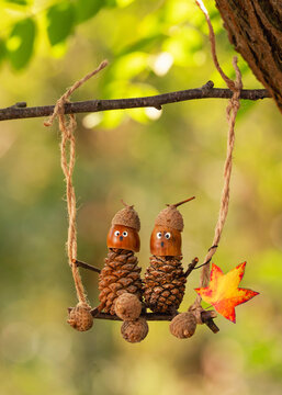 Beautiful Handmade Fall Arrangement Surrounded by Autumn Foliage