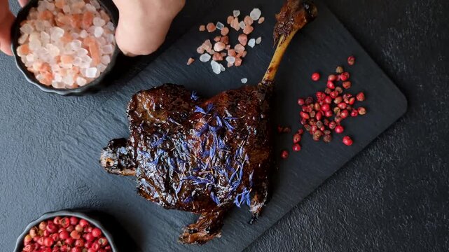Duck leg confit roasted with salt and allspice. Duck leg confit