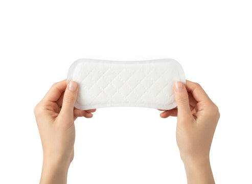 A pair of hands holding a single white feminine sanitary napkin, displaying the soft surface and quilted diamond pattern, isolated on black background isolated on a transparent background