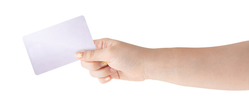 A close up female hand holds a silver card isolated on white background with a clipping path.