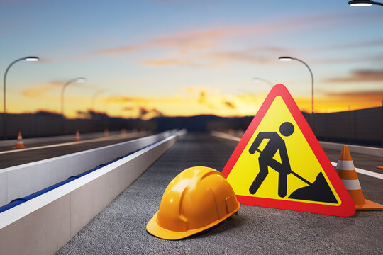 Road construction warning sign, safety helmet and traffic cones on highway at sunset with illuminated streetlights and empty roadway. 3D Rendering