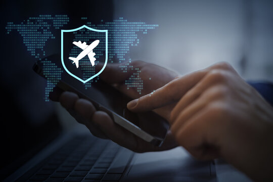 Corporate airline travel booking on smartphone with airplane shield, global map, and digital security concept for business flight technology.