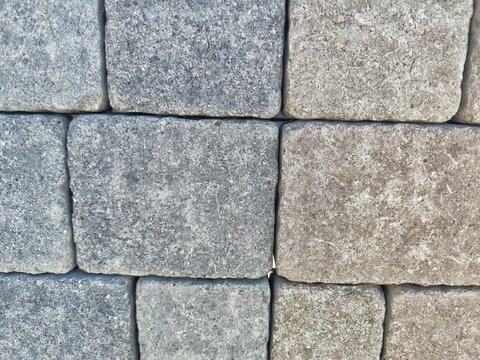 Dual tone grey and brown concrete pavers texture background for landscaping
