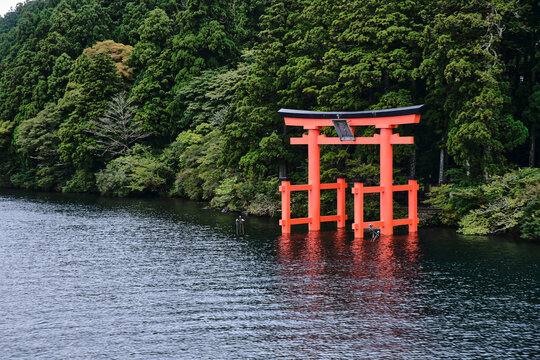 A Japanese Shinto shrine gate also known as a Torii on Lake Ashi