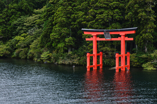A Japanese Shinto shrine gate also known as a Torii on Lake Ashi