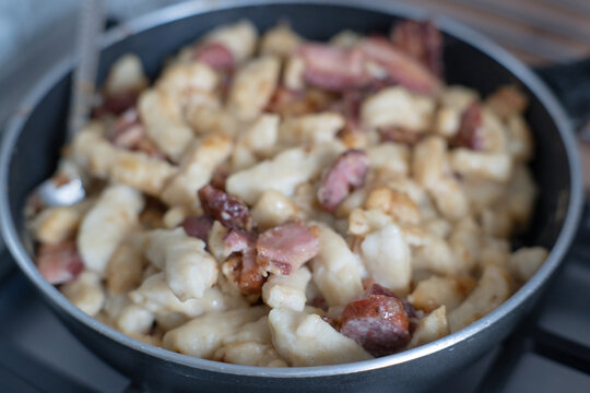 Kopytka &ndash; in Polish cuisine, a type of thick, diamond-shaped dumpling made from boiled potatoes, flour, and eggs.
