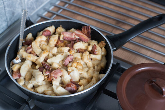 Kopytka &ndash; in Polish cuisine, a type of thick, diamond-shaped dumpling made from boiled potatoes, flour, and eggs.
