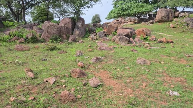 Stone Paved Trail Across Green Hillside
