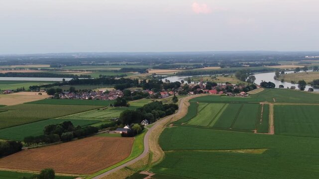 Aerial view of a Dutch village and marina on the Maas river drone shot