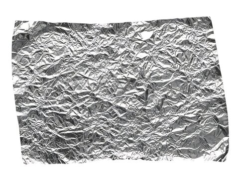 A close up view of the wrinkled and reflective texture of aluminum foil