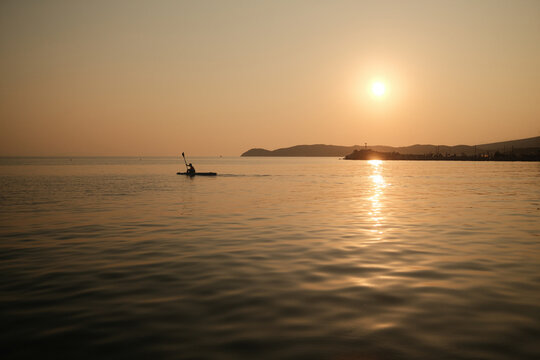 Rowing in the sunset
