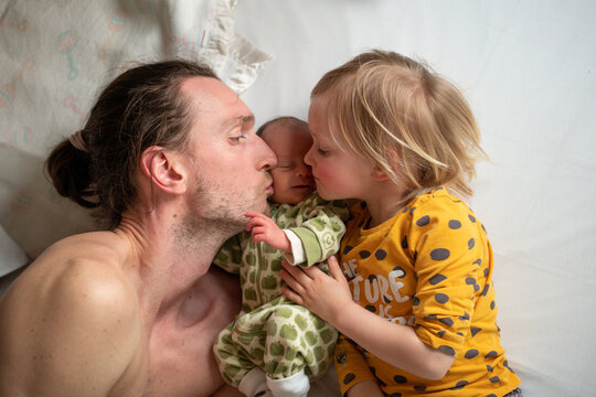 A big kiss for the new born baby