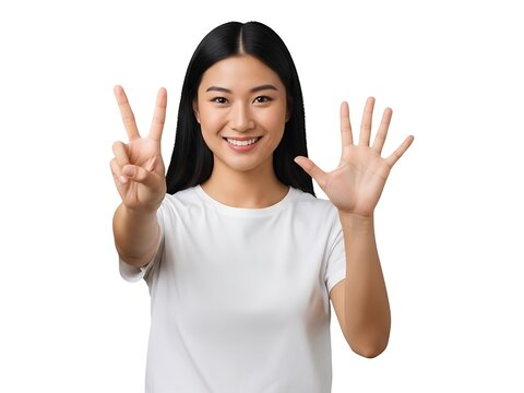 A young asian woman holding up seven fingers with a cheerful expression