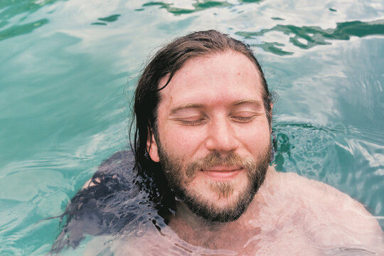 Man enjoys water while relaxing