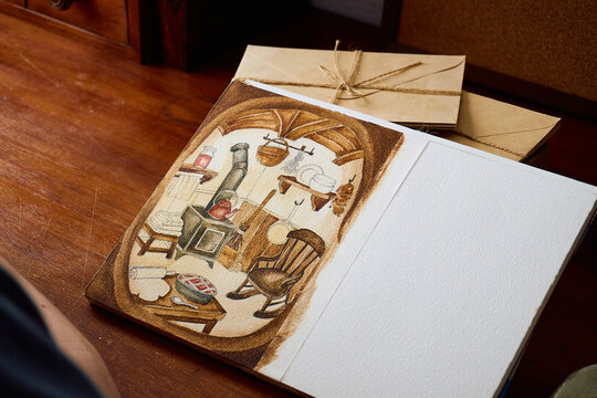 Cozy vintage kitchen watercolor illustration in open sketchbook