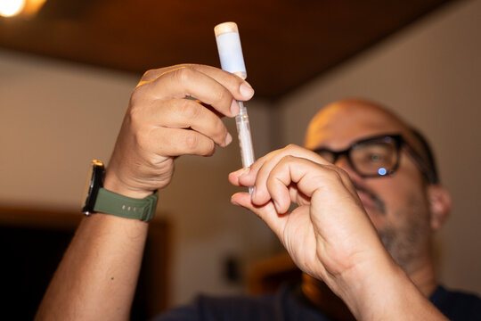 Preparing a medical syringe for self-administered treatment