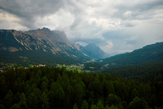 Panorama view of the valley bordered by the Dolomites.