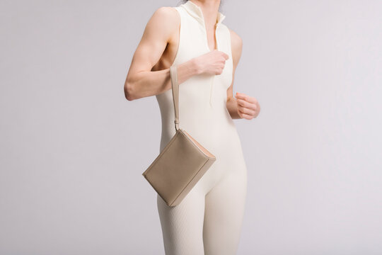 Minimalist Beige Clutch With Ribbed Bodysuit