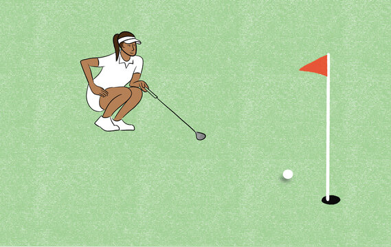Golfer Prepares to Make a Putt