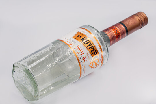 De Kuyper Triple Sec orange liqueur bottle closeup on white.