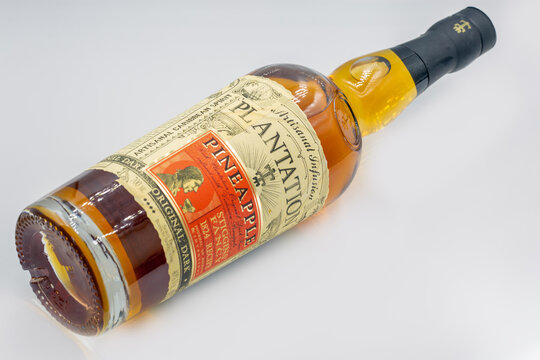 Pineapple Plantation Original Dark rum bottle closeup on white.