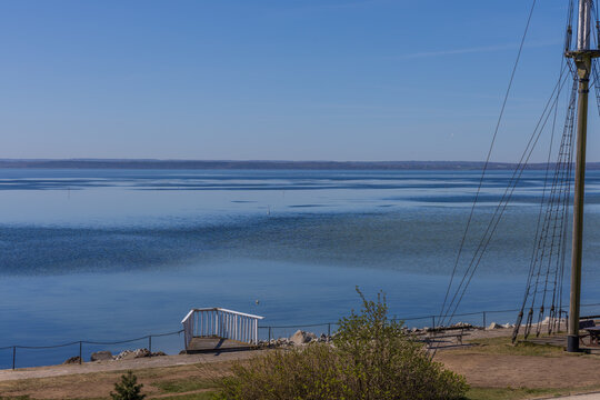 Panoramic seascape view from Hel, Poland with Puck Bay and historic ship mast.