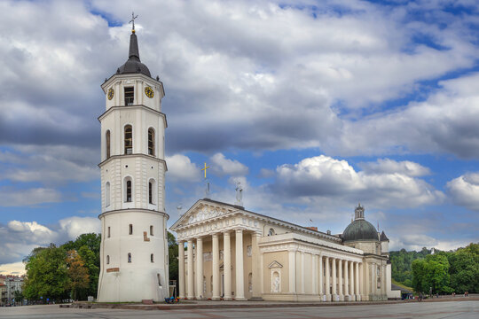 View of Vilnius Cathedral and the bell tower in Vilnius, Lithuania. Classical stone architecture under partly cloudy sky