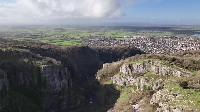 Aerial Drone View of Cheddar Gorge Limestone Cliffs and Somerset Countryside Panorama in England