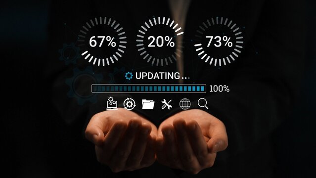 Hands Holding Virtual Interface With Progress Indicators and Loading Animation Representing Digital Update Process and Data Management Concepts. Entropy.