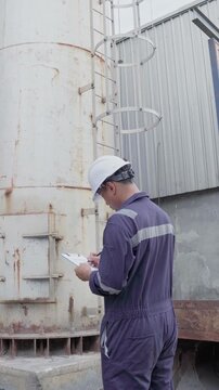 Engineering work taking note report check maintenance Exhaust system concept Clean air environmental protection.Factory industrial manufacturing. Sustainable future environment air pollution reduction