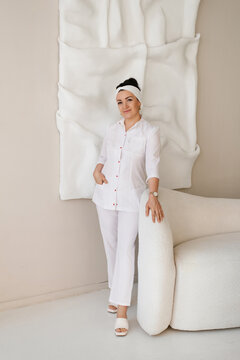 Elegant Female Doctor Standing in Modern Interior