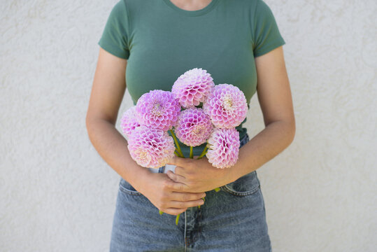 Woman Holding Pink Snoho Sonia Dahlia Bouquet