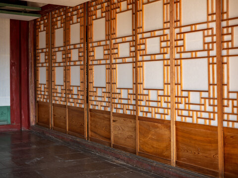 View of the traditional wooden lattice doors with hanji paper at Gyeongbokgung Palace in Seoul, Seoul, South Korea.