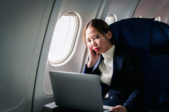 businesswoman feels stress fatigue tired exhausted working remot
