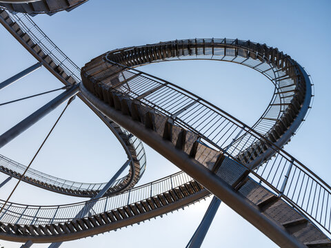 View of the Space Walk steel staircase sculpture with its looping tracks against a clear blue sky in Pohang-si, Gyeongsangbuk-do, South Korea.