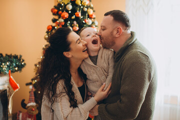 Fototapeta premium Happy family enjoying christmas celebration